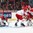 MONTREAL, CANADA - DECEMBER 30: Denmark's Kasper Krog #31 goes to cover up the puck while Christian Mieritz #12, Christian Wejse-Mathiasen #13 and Switzerland's Nathan Marchon #15 battle in front of the net during preliminary round action at the 2017 IIHF World Junior Championship. (Photo by Francois Laplante/HHOF-IIHF Images)

